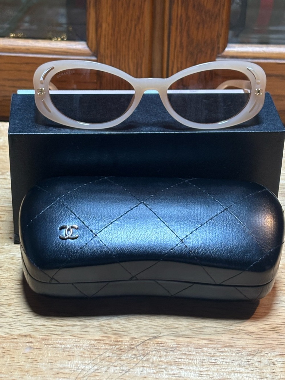 Classic Chanel logoOval Cream Frame Sunglasses with Brown Lenses